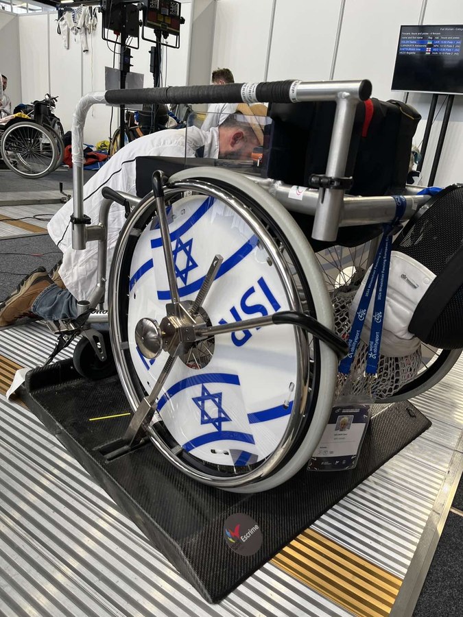 Israel fencer on competition frame — ISR wheel cover