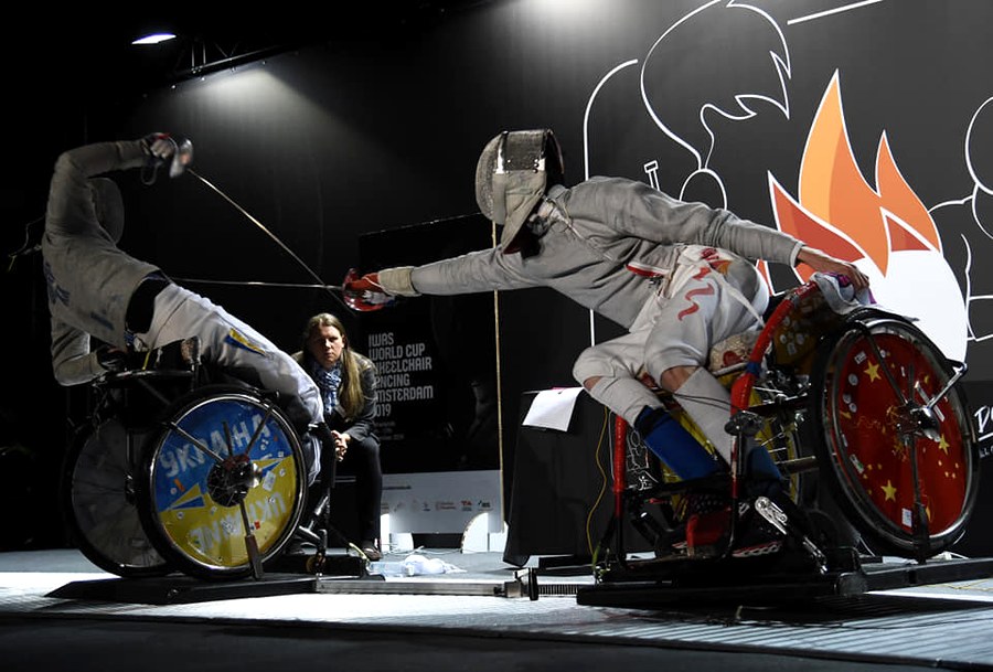 Ukraine Paralympic team Paris 2024 opening ceremony — Ukraine wheel covers visible